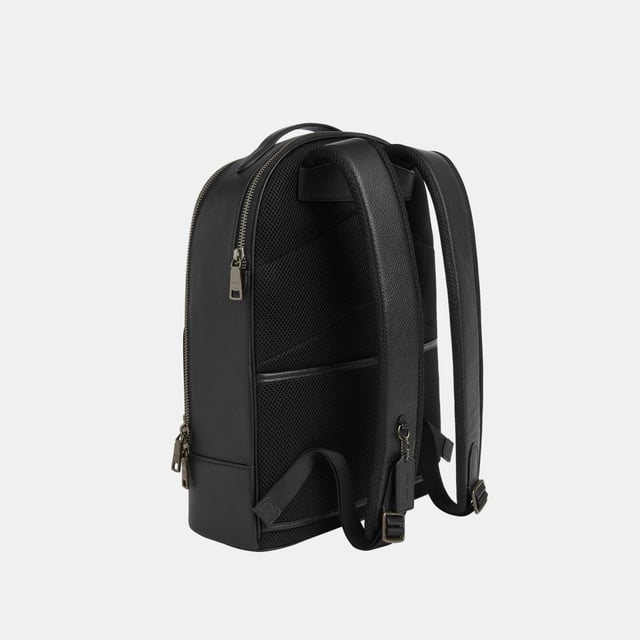Ethan Backpack in Blocked Signature Canvas, Laptop compartment with zip closure
 Luggage sleeve, Two credit card slots
 Two pen pockets
 Attached strap with dogleash clip
 Inside zip and multifunction pockets
 Inside tech sleeve, Outside zip and open pockets,  Length: 32.00 cm,  Width: 13.50 cm,  Height: 42.00 cm