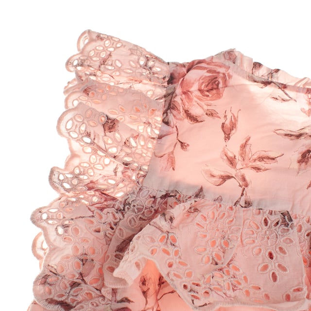 This girl's T-shirt features a romantic and charming style, with a delicate floral design throughout the fabric.

 Lace ruffles on the shoulders add volume and texture, creating a striking, feminine silhouette.

 The front closure with small buttons adds a classic and detailed touch, while the elasticated bottom ensures a comfortable and flattering fit for little ones.

 This top is perfect for pairing with other casual outfits, offering a mix of vintage and modern style in one garment.
 Composition: Exterior: 100% Cotton; Interior: 100% Cotton; Embroidery: 100% Polyester
 Care:
- Machine wash cold.
 - Use similar colors in the wash.
 - Avoid the use of bleaches.
 - Dry at low temperature in the dryer.
 - Iron at low temperature.
 - Do not dry clean.