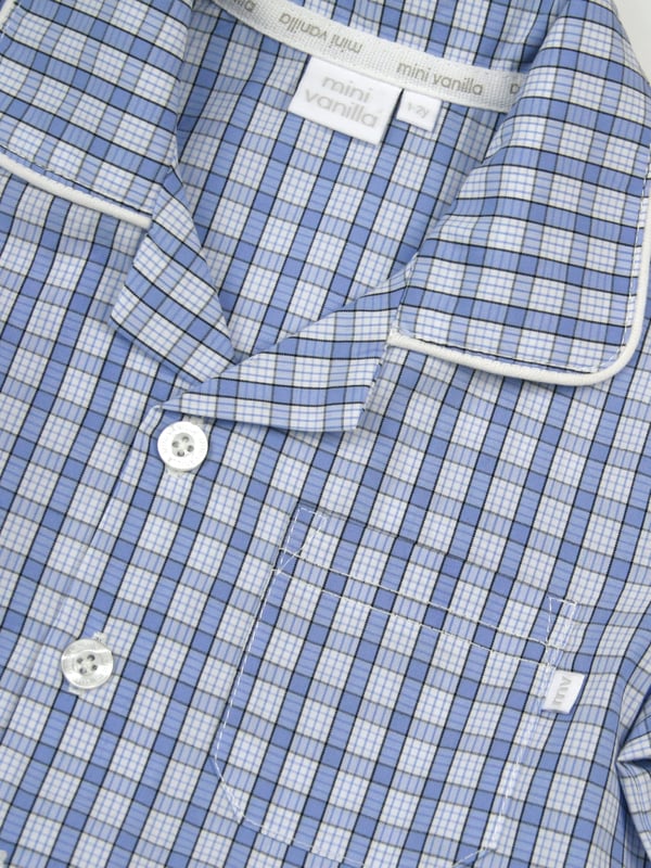 Boys mini check PJ with shorts in shades of mid blue. Spring & Summer weight 100% Cotton with short sleeves
Spotlight on Summer styling with our Traditional Shortie pyjamas, button through top with a front pocket and contrast piping. The shorts have an elastic waist, making them easy to get on and off.
100% Cotton
Elastic waist
Front pocket
Button through top
Machine washable
Contrast piping detail
