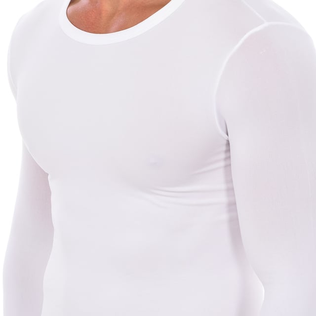 Camiseta interior de manga larga Intimidea.
Color Blanco
Cuello redondo elástico.
Manga larga con costura en los puños.
Tejido cómodo y elástico sin dejar marcas.
Costuras vistas a tono.

Composición:  92% Poliamida, 8% Elastano

Lavar a temperatura maxima 30º.
-No usar lejía.
-No usar secadora.
-No usar plancha.
-No lavar en seco.