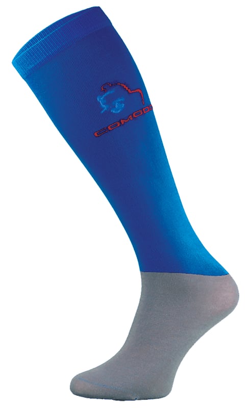 Comodo Microfibre Horse Riding Socks  Comodo have been providing high-quality socks for men and women since 1996. They sell a range of socks for hiking, cycling, hunting, skiing, and now, horse riding! Whichever type of socks you wear, your feet are bound to feel comfortable and warm, no matter the weather or environment!  It's important to wear soft and comfortable socks when horse riding. That's why Comodo have crafted microfibre horse riding socks foe men and women.  These socks are lightweight and functional as they fit effortlessly under riding boots for a cool, comfortable ride.  They have been constructed in fine microfibre to provide maximum protection against abrasion, and the breathable knit keeps legs cool in the summer and warm in the winter.  The soft touch cotton material also helps to wick away moisture and sweat especially, if you've been horse riding for longer hours in the summer.  With their support and reinforcements in all the right places, Comodo riding socks are sure to look great and maintain their condition wear after wear.  Choose from these colourful block panels for your favourite pair of horse riding socks. These socks are made from 45% Polyamide Microfibre, 25% Cotton, 25% Polyamide, 5% Elastane. They are available in sizes 3-5.5 UK, 6-8 UK, 35-38 EU, 39-42 EU. These socks are hand washable at 30 degrees.  Extra Product Details  - Microfibre Horse Riding Socks  - Lightweight Feel  - Microfibre Leg  - Knee-High Length  -Cotton Foot  - Reinforce Sole  - Men and Womens  - Hand Washable at 30  - 45% Polyamide Microfibre, 25% Cotton, 25% Polyamide, 5% Elastane