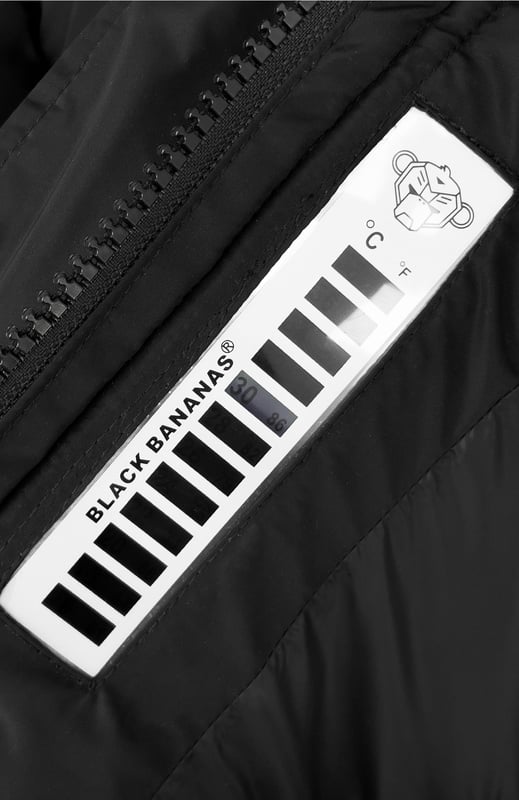 100% Polyester Short fit High collar with zipper and button closure BLCK BNNS logo on left chest Two front pockets Adjustable cuffs Side pocket on left arm Detachable zipper pouch 