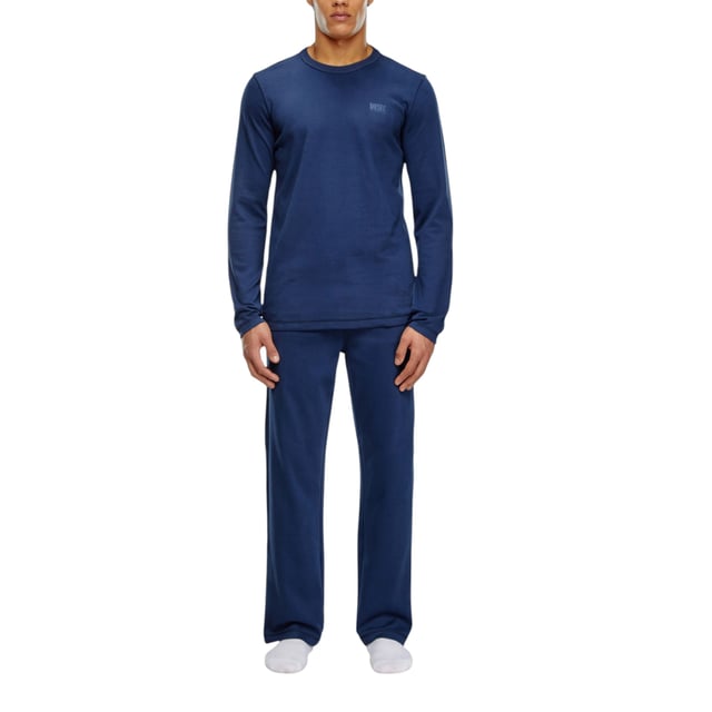 Diesel Men's Pyjama Set
Style Name: UMSET ARAMIS
Style Code: 0THAU
100% Cotton 
Made In India
Regular Fit
Brand Logo
Solid Logo
Crew Neck 
Long Sleeve T-Shirt
Side Slit Hem Line
Adjustable Drawstring With Pyjama
Full Set (Top And Botton)
Size: S-XL
Colour: Navy Blue
Machine Wash (Please See The Instruction Before Wash)