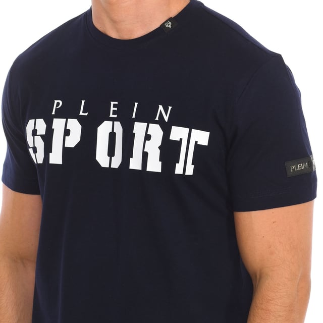 Plein Sport short sleeve t-shirt.
 Round neckline with ribbed finish.
 Brand print on the front.
 Claw print on the back side.
 Brand insignia on one sleeve.
 Seams seen in tone.
 Composition: 100% cotton
 Care:
Wash at maximum temperature 30º.
 Iron at medium temperature.
 Do not use dryer.
 Do not use bleach.
 Do not dry clean.