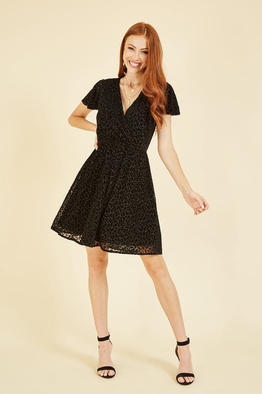 Mela london leopard print new arrivals wrap dress