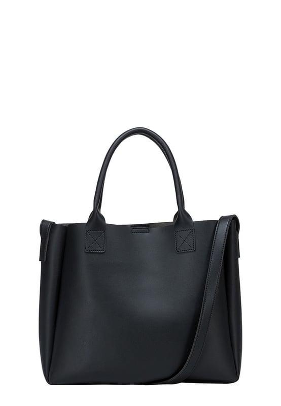 Be anything but basic with this classic wardrobe staple. The Megan XL Tote is the perfect accessory for making a statement and is highly functional too. Inside is a spacious compartment, big enough to carry the days essentials. You can also find a pouch which can be removed, ideal for storing items you want to keep extra secure, or use it as a mobile makeup bag! You have a choice of styling with the tote grab handles and the adjustable shoulder strap, so you can change your look depending on your chosen style! Features: , Lightly textured PU exterior, Claudia Canova debossed logo, Magnetic clasp fastening, Two exterior slip pockets, 2 x tote grab handles, Adjustable shoulder strap, Interior pouch which can be removed using the snap button clasps, Pouch measurement: W 304 x H 203 x D 63 mm, Zip top fastening on interior pouch Style Ref: 84607 BLACK