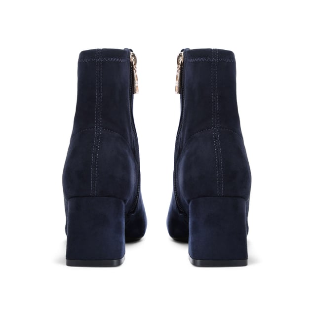 The Quant Ankle Boot is crafted from a navy microsuede. This boot has a higher ankle and block style heel.