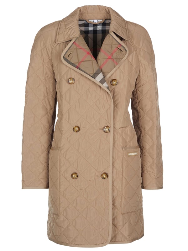 100% polyester; Burberry gewatteerd jack Tything;  Model: 80842001;  Hoogwaardige afwerking;  Klassieke kraag;  Lichtgewicht overgangsjack;  Double-breasted met elk vier knopen;  Twee voorzakken;  diamant quilten;  Geruite voering typisch voor het label;  Burberry-logodetails