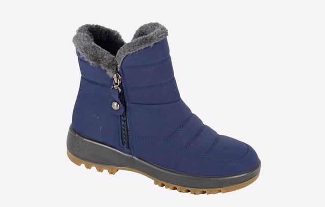 The Boulevard Connie Women's Thermal Lined Ankle Boots are a perfect blend of warmth, comfort, and style, designed to be your go-to footwear during the colder months. Crafted with care and attention to detail, these ankle boots offer a sleek yet practical design that caters to both functionality and fashion. The thermal lining inside the boots ensures your feet stay warm and cozy even in the coldest conditions, making them an essential choice for winter. This insulation is especially effective at trapping heat, allowing you to step out into cold weather with confidence that your feet will remain protected from the chill.- Nylon upper- Zip closure- Thermal lined- Cushioned footbed- Durable rubber outsole- Boulevard branding