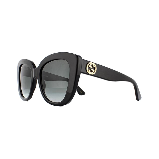 Gucci Sunglasses GG0327S 001 Black Grey Gradient are a bold acetate cat eye style for women. Embellished with the interlocking GG logo on each temple. These sunglasses are guaranteed to make a statement this summer!.