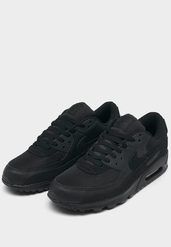 Step up your sneaker game when you step out in the classic Men's Nike Air Max 90 Casual Shoes. Low top silhouette with padded collar and tongue for comfort. - - . Retro runner turned lifestyle sneaker design. - - . Textile upper with synthetic and leather overlays. - - . Nike Max Air unit in heel for support and cushioning. - - . Flexible sole design encourages a more natural stride. - - . Rubber outsole with waffle traction pattern. - - . The Nike Air Max 90 is imported.