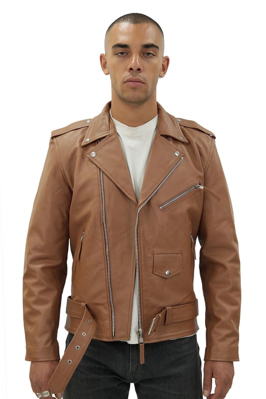 This slick Brando jacket is characterised by its off centred YKK zip front which is paired with wide set notch lapels. The jackets flair is brought out by the stud epaulettes on the shoulders and zipped gauntlet cuffs which also offer a more customisable fit. A cow hide belt is fitted across the waist for increased adjustability and the lining and exterior are fitted with stud fastened and zipped pockets for added convenience. In a range of colours to suit all styles and tastes, this iconic piece is as versatile as it is stylish. • Premium cowhide jacket in the classic Brando style • Zipped gauntlet cuffs • Comfortable close fit design • Asymmetric YKK zip front • Stud fastened and zip exterior compartments • Adjustable waist belt • Slanted zipped breast pocket • Pockets integrated into the jacket lining • Wide notch stud fastened lapel
