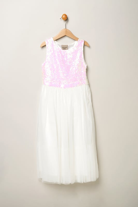 Dazzle and delight in this enchanting sequin bow dress from Luna Moon by Miss, adorned with a large bow on the back. Perfect for special occasions, this stunning ensemble exudes elegance and charm, seamlessly transitioning from shimmering sequins to a dreamy tulle skirt. Elevate your little one's style with this shimmering masterpiece, guaranteed to make a statement and capture hearts wherever she goes. Shop now for the perfect blend of sparkle and sophistication!