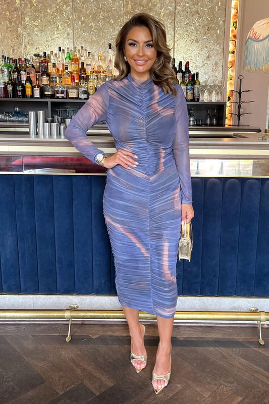 Contour your body in our Purple Tie Dye Print High Neck Long Sleeve
Ruched Midi Dress. Featuring our premium mesh fabric with body lining,
a bodycon silhouette, long see through sleeves, a high neck, ruched
body and zip up back. Pair it with strappy heels and some statement
jewellery for a stunning evening look.

Model wears: UK 10/ EU 38/ US 6
Model's height: 168cm/ 5'6"
Approx length from centre back to hem: 121cm
Fabric composition: 95% Polyester 5% Elastane
Colour: PURPLE

*print position may vary*