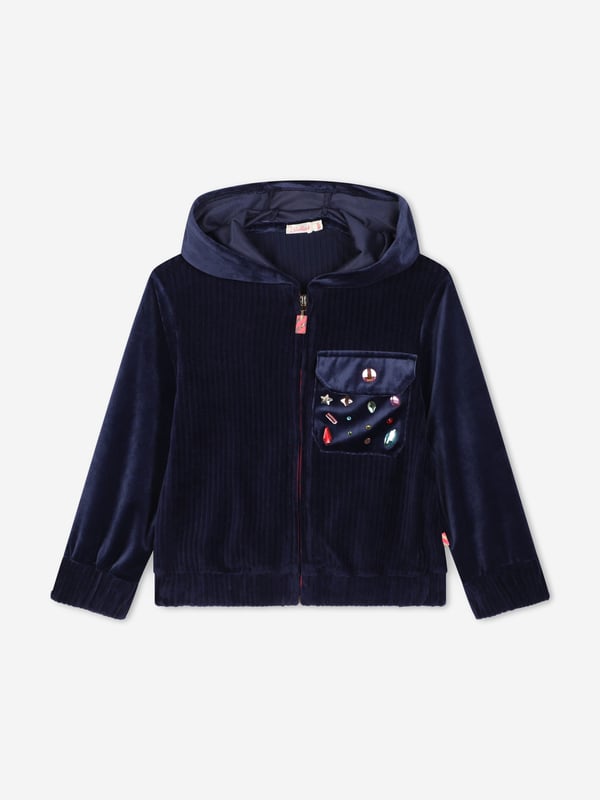 Introducing the Girls Velour Zip Up Top in Navy from billieblush, a true reflection of sophistication and comfort for the AW2024 season. Each piece meticulously crafted to offer an unparalleled experience for your little girl. Here are the standout features: **Chic Navy Hue:** Timeless navy colour that oozes elegance versatility.   **Luxurious Comfort:** High-quality fabric ensures all-day comfort, perfect for your girl's dynamic life.   **Designer Accents:** Unique billieblush detailing sets this tracksuit apart, making it not just apparel but a style statement.   **Functional Pockets:** Stylish yet functional pockets for keeping little treasures safe.Elevate her wardrobe with this exquisite designer ensemble. Ideal for both casual and special occasions!