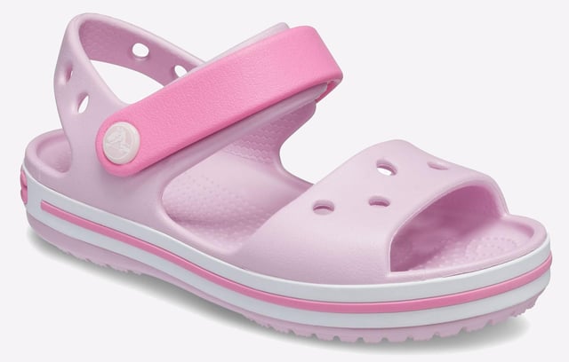 They will dazzle in our kids sandal with cute colours and a comfy fit. Jibbitz charm holes let them add a personal touch.
- Sporty Crocband style for little ones
- Croslite material cushions and comforts
- Heel and ankle strap for a more secure fit
- Comfort Rating: Iconic