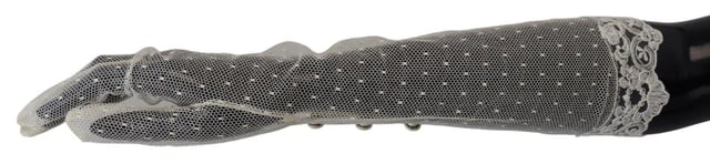 Gorgeous brand new Dolce & Gabbana elbow length gloves
  Made in Italy
  Logo details
  Crafted with high craftsmanship
  Material: 90% Cotton 7% Viscose 3% Nylon
  Rare and stylish
  Perfect for adding sophistication to any outfit