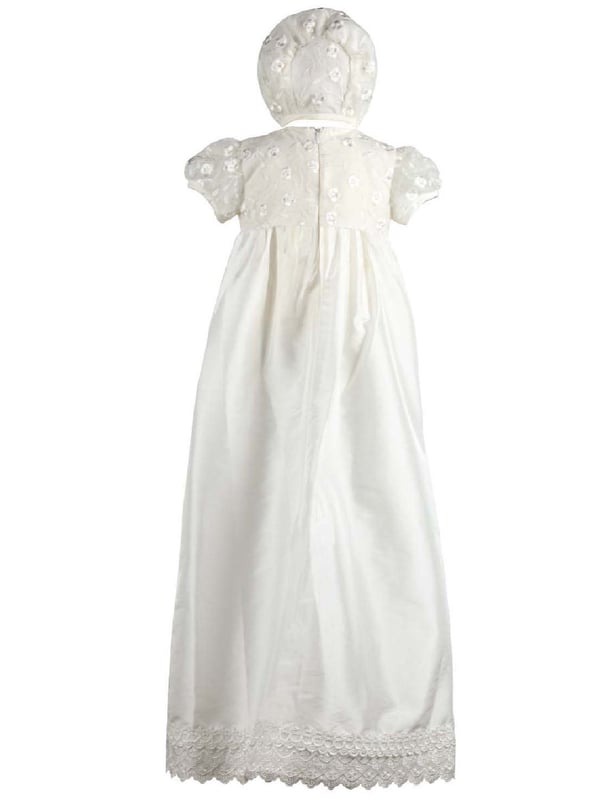 Could the Heritage Nessa Traditional style long Christening Robe, be your next family Heirloom!
This beautiful Christening dress has a lace bodice and short sleeves. Around the hem is a beautiful a lace trim.
We've added a concealed back zip fastening so you can't see it - also making it easy to get on and off.
As part of the outfit it comes with a matching cotton lined bonnet.
You could team it up with one of our bolero cardigans in case of our unpredicatable UK weather :(
We also have some lace knickers in a matching fabric that keep nappies covered and looking good. Look for style XENA in our Accessories section
Both items are lined in 100% lightweight soft cotton making it feel so soft against your baby's skin and good for any little ones with sensitive skin.
The dress comes on a satin ribboned padded hanger and protected in a Heritage garment over bag.
Outer - 100% polyester - mock silk
Lining - 100% Cotton
Hand wash or Dry Clean only.