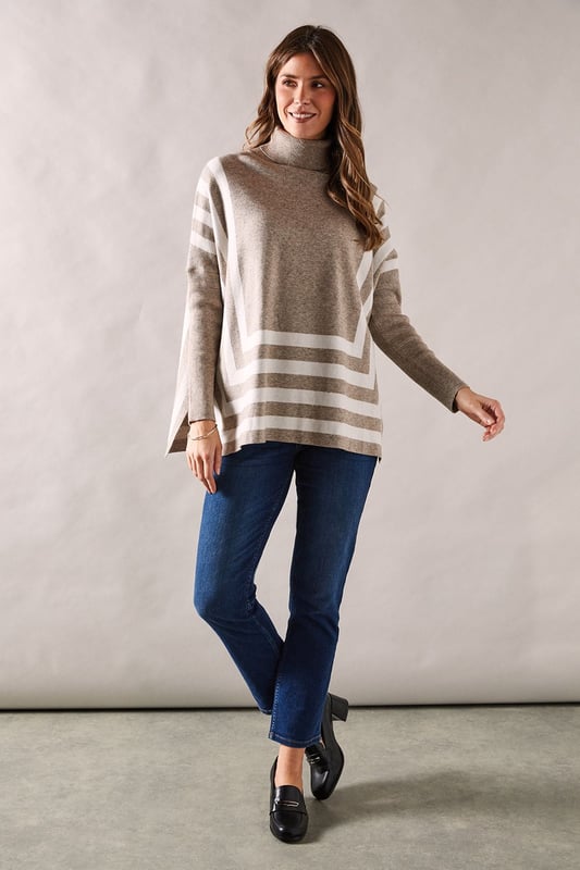 Chic striped roll neck poncho design
        Oversized, relaxed fit for ultimate comfort
        Elegant contrasting stripe pattern
        Long sleeves with dropped shoulders
        Versatile length suitable for various styling options
    
    Embrace sophistication and comfort with this striking striped roll neck poncho from Wallis. The oversized silhouette offers a relaxed fit, perfect for those who appreciate both style and ease. The elegant contrasting stripe pattern adds visual interest, while the long sleeves with dropped shoulders contribute to its laid-back charm. Ideal for casual events and family gatherings, this versatile piece can be styled effortlessly. Pair it with slim-fit trousers and ballet flats for a polished daytime look, or layer it over a fitted dress with ankle boots for a more refined ensemble. The poncho's adaptable length allows for various styling possibilities, making it a wardrobe staple for the fashion-forward woman who values both glamour and practicality in her everyday attire.