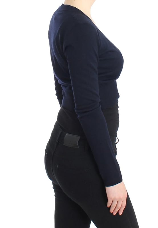 Brand: Class Roberto Cavalli
  Material: 100% Virgin Wool
  Color: Blue
  Style: Cropped Cardigan
  Button closure in the front
  Logo details
  Original tags and store bag included
  Gender: Women
