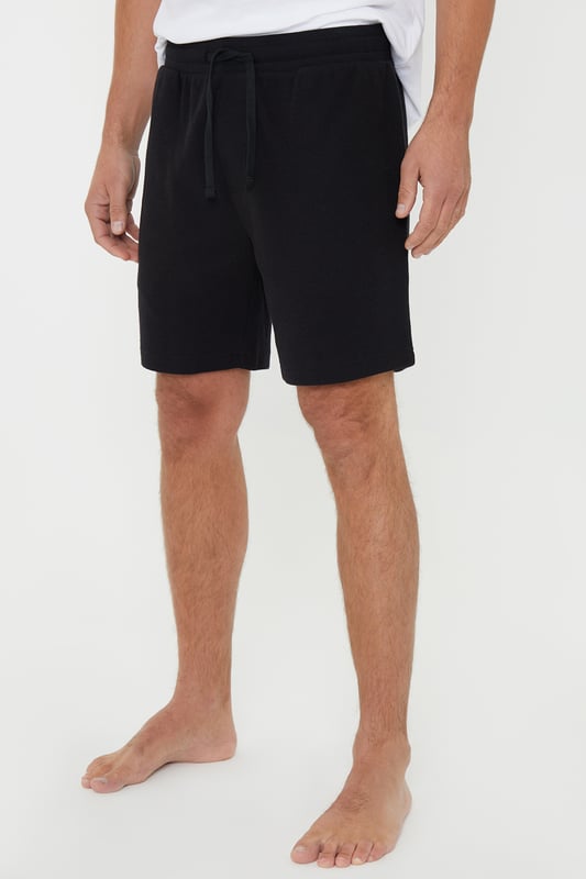 Unwind in ultimate comfort with this three pack of textured cotton pyjama shorts from Threadbare. These shorts are made from a soft touch cotton waffle fabric, feature an elasticated waistband with adjustable drawcords that make them comfy and easy to wear, and have two handy side pockets. Whether you plan on sleeping in them or relaxing on the sofa, these loungewear shorts are ideal.