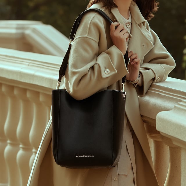 The Romai in black by Victoria Hyde London is your perfect everyday companion. Never before has functionality and trendiness been so seamlessly combined.  It is a perfect bag for the essentials you need.

Dimensions: 23cm x 30.5cm x 17cm
Surface material: PU leather (lychee pattern)
Lining: PU leather (fine grain)
Shoulder Straps: Twill Cotton Webbing

Romai handbag is available in green and yellow colors.