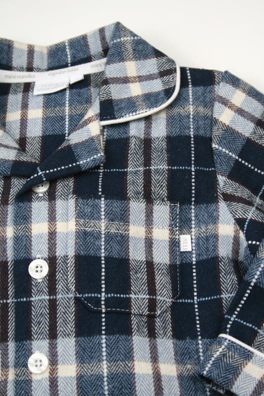 Wrap your little one in timeless comfort with our Boys' Traditional Check PJ Set, perfect for cosy nights and laid-back mornings. Made from soft, breathable cotton fabric, this classic check pyjama set features a stylish button-up top with a relaxed fit, paired with matching elastic-waist trousers for easy wear. Designed for durability and ultimate comfort, these boys' check pyjamas are ideal for lounging or bedtime.
Whether you're looking for traditional boys' sleepwear, a classic check pattern PJ set, or the perfect gift for boys, this set offers both style and cosiness. Suitable for the autumn / winter season, these boys' PJs combine heritage style with modern comfort, ensuring your child sleeps soundly and looks great.