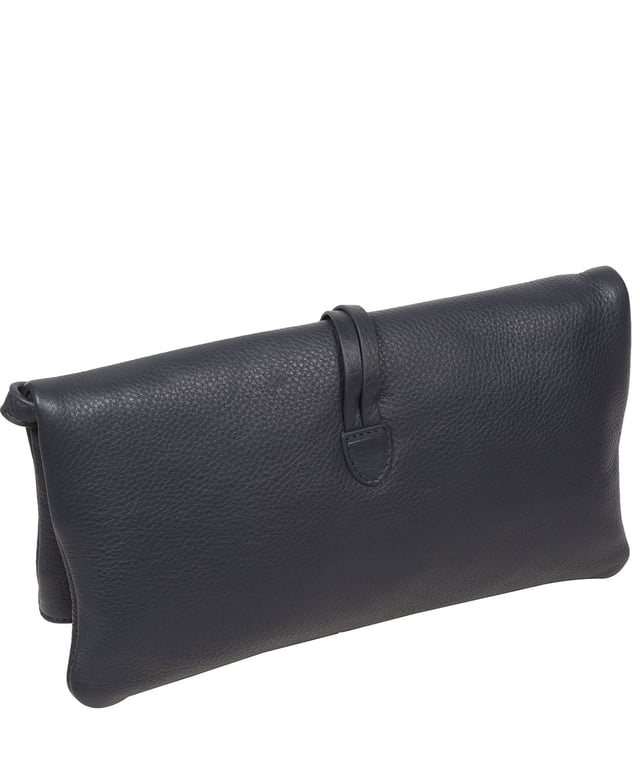 The 'Selene' cross body clutch bag from the Pure Luxuries Marylebone Collection is handcrafted from high-quality, genuine Nappa leather with a natural super-soft touch. The fold-over top secured by two magnetic press studs, opens to reveal a zipped main compartment and a slip pocket. The interior is lined with 100% cotton and includes two slip pockets to help maintain an organised bag. Comes with a matching and adjustable slim leather strap, with a maximum drop length of 65cm. The strap is also removable, transforming the bag into a clutch bag. Features gold-coloured metal fittings and zip. The Pure Luxuries logo is embossed for an effortless and sophisticated finishing touch.