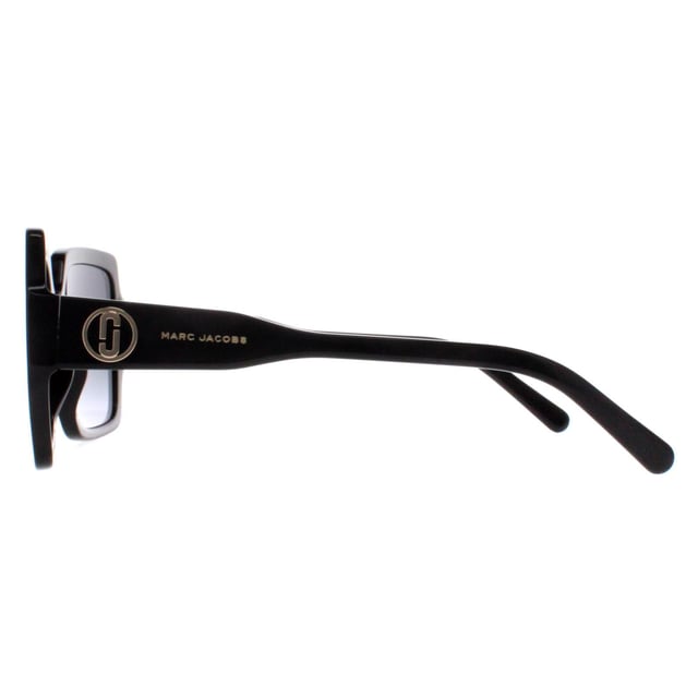 Marc Jacobs Cat Eye Womens Shiny Black Dark Grey Gradient MARC 731/S  Sunglasses are crafted with precision and finesse, the frame embodies a sleek yet distinctive silhouette, showcasing premium materials that guarantee both durability and comfort. The lenses, known for their superior quality, offer not just a fashion statement but also optimal protection against harmful UV rays. Emblazoned with the signature Marc Jacobs detailing, these sunglasses encapsulate refined style and timeless appeal, making them a quintessential choice for those seeking to effortlessly elevate their look with a touch of luxury and sophistication.