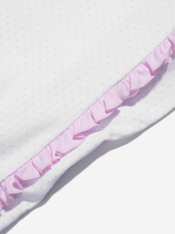 Presenting the Baby Girls Swan Embroidered Cross Ruffle Babygrow in White by Magnolia Baby. A stylishly elegant addition to your Baby_Girl's clothing ensemble. Its key features are:     Chic Design: Elegant swan embroidery makes it an instantly attractive piece. Cross ruffle patterns add an extra flair of sophistication. Supreme Comfort: Crafted with high-end materials for ultimate softness and comfort, ensuring uninterrupted playtimes and peaceful sleep.  Transform your Baby_Girl's attire with this beautiful Swan Embroidered Cross Ruffle Babygrow from Magnolia Baby in white. Make a purchase now and let your little fashionista shine brightly!