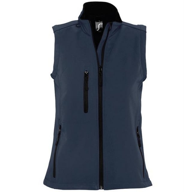 Stretch soft shell fabric has a polyester/elastane outer, membrane and a polyester fleece backing. Mesh lined front body panels. Breathable, windproof and water resistant. Shaped fit. Taped neck. Collar high full zip with inner storm flap and chin guard. Two front zip pockets and one right chest zip pocket. Adjustable drawcord at hem. Drop tail. Access for decoration. Material: 94% polyester/6% elastane. Ladies size: S(8/10), M(12), L(14), XL(16), XXL(18).