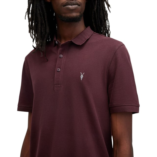 All Saints Men’s Pique SS Polo Shirts
Style Name: Reform
Style Code: M075PB
100% Cotton
Made In India
Slim Fit
3 Button Placket
Ramskull Logo to the Chest
Knitted Rib Collar And Cuffs
Short Sleeve
Casual Wear, Comfort Fabrics
Soft And Breathable
Machine Washable
