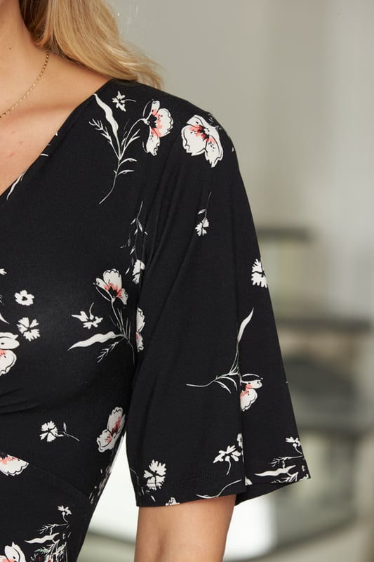 REASONS TO BUY: 

Nothing beats a new nice top
Twist front, V-neck, fluted sleeves: this one's a real figure-flatterer
Soft fabric means it's comfy too
You can't go wrong with florals
Body-skimming fit and longline hem
Just add jeans.