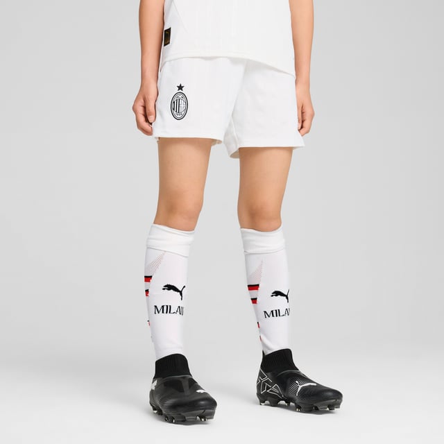 PUMA Boys AC Milan 24/25 Shorts PRODUCT STORY: Hit the pitch like AC Milan's finest in these football shorts. They're made from sweat-wicking material to keep you cool in the tensest moments of the game and are finished with the team's famous crest on the leg. FEATURES & BENEFITS: dryCELL: Performance technology designed to wick moisture from the body and keep you free of sweat during exercise; As part of the RE:FIBRE program, this garment is made of at least 95% recycled material from textile waste and other used materials. DETAILS: Regular fit; 170 gsm, Jacquard; Medium rise; Official team branding; PUMA branding details; PUMA Youth: Recommended for older kids between 8 and 16 years.