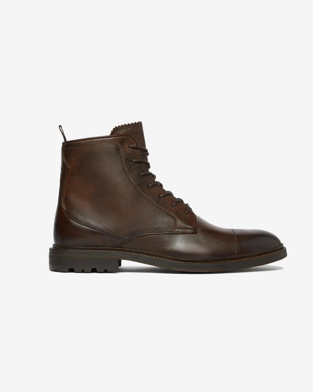 Chaves is a beautifully casual derby boot, perfect for weekend walks. Hand crafted in dip dyed leather for a unique finish and a rich depth of colour, it's then finished with a cleated rubber sole for added grip and durability.

Dip dyed leather upper
Calf leather lining
Leather sole with rubber inlay
Cotton heel pull tab
Hand-burnished toecap

 