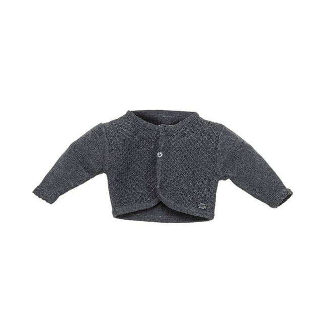 Tricot knit jacket.
 Closed round neck.
 Button closure on the front.
 Plate with the name of the brand on the lower side.
 Composition: 75% Cotton, 20% Polyamide, 5% Wool
 Care:
- Wash maximum at 30ºC.
 - Iron at medium temperature, max. 110ºC.
 - It is not allowed to use a dryer.
 - Do not use bleach.
 - Does not support dry cleaning.