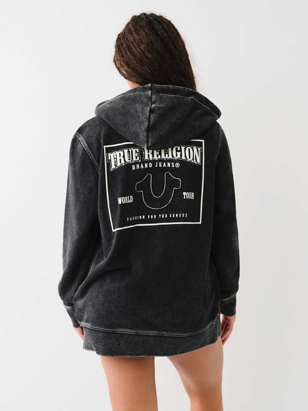 Get cozy in the Acid Wash Big T Boyfriend Zip Hoodie. Crafted from soft, fleece-lined knit, this hoodie features a vintage acid wash, zip-up front, drawstring hood, split kangaroo pocket, and dropped long sleeves. Finished with horseshoe appliques, Big T stitching, and a back True Religion World Tour logo.