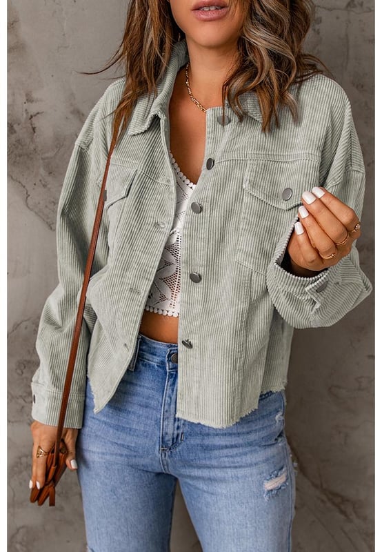 Made from Quality corduroy fabric
  Raw hem design for an edgy look
  Features flap pockets for functional storage
  Cropped length for versatile styling
  Perfect for layering over dresses or pairing with high-waisted jeans
  Available in multiple sizes
Material: 100% Cotton