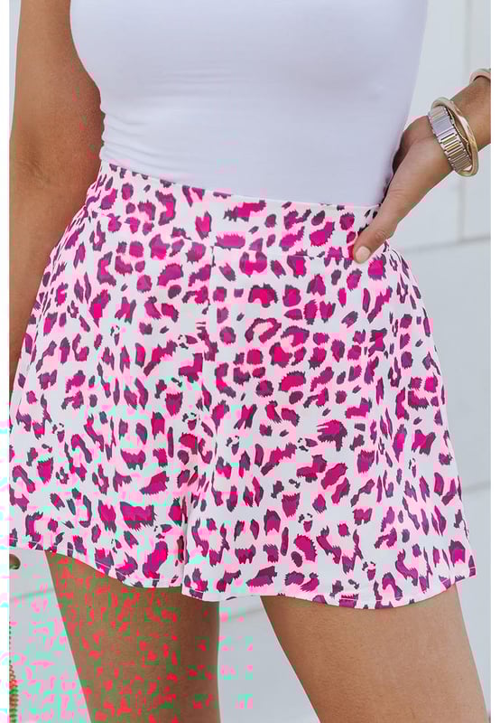 Quality materials
  Leopard print design
  Flutter detailing on the hem
  Comfortable and durable
  Versatile design
  Easy to pair with different tops and shoes