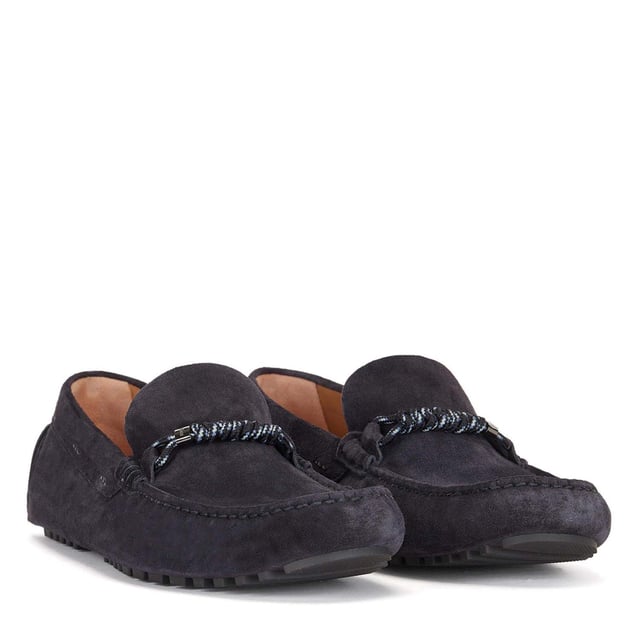 Men's Boss Driver Moccasin Shoes in Dark Blue Mens BOSS Driver Moccasin Shoes in dark blue.- Made in Italy.- Full suede upper design for a casual look.- Trimmed with seasonal chord hardware on the vamp. - Rubberised injected outsole and a cognac-leather lining delivers elevated comfort in every step.- Ref: 50472511-401