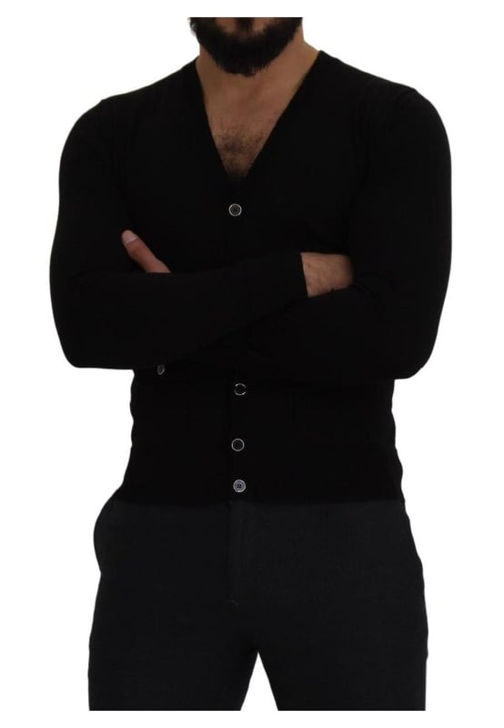 100% authentic Dolce & Gabbana cardigan sweater
  Crafted from Quality wool
  Classic black color
  Full button closure
  Logo details
  Made in Italy
  Material: 100% Virgin Wool