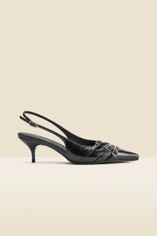 Introducing your AM to PM go-to shoesTimeless slingback style with a sleek pointed toeSet on a comfy-chic kitten heel Elevated with a statement buckle strap detail Adjustable strap for the perfect fit Dress them down with denim, up with