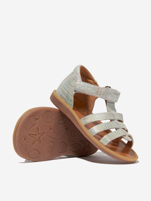 Introducing the Girls Leather Poppy Strap Sandals in Silver by Pom D Api, a summer essential for your girl's wardrobe! This fashionable sandal pairs style with comfort perfectly. Notable features include: Chic Silver Hue: The silver colour gives a chic, high-end designer appeal allowing your girl to step out in style. Genuine Leather Straps: The poppy-hued straps, made from premium quality leather, provide excellent durability while ensuring utmost comfort. Summer Staple: Lightweight and breathable, these sandals make the perfect footwear choice for summer. Revamp your girl's wardrobe with these Leather Poppy Strap Sandals. Create unforgettable summer memories in style and comfort. Order now!