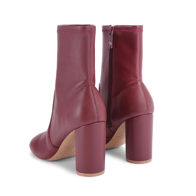 This Langley Round Ankle Boot features a wine upper crafted from a soft leather. The heel is rounded matching the toe shape. Heel height: 9cm.