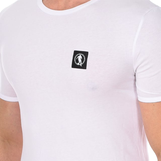 Bikkembergs short sleeve t-shirt.
 White color
 Round neck with ribbed finish.
 Fabric label personalized by the brand, on the upper side.
 Comfortable and breathable fabric.
 Seams seen in tone.

 Composition: 95% Cotton, 5% Elastane

 Care:
 -Wash at max temperature. 40ºC.
 -Do not use bleach.
 -Supports dry cleaning.
 -Allows you to use dryer.
 -Iron at max temperature. 130ºC.
 Composition: 95% Cotton, 5% Elastane
 Care:
Care:
 -Wash at max temperature. 40ºC.
 -Do not use bleach.
 -Supports dry cleaning.
 -Allows you to use a dryer.
 -Iron at max temperature. 130ºC.