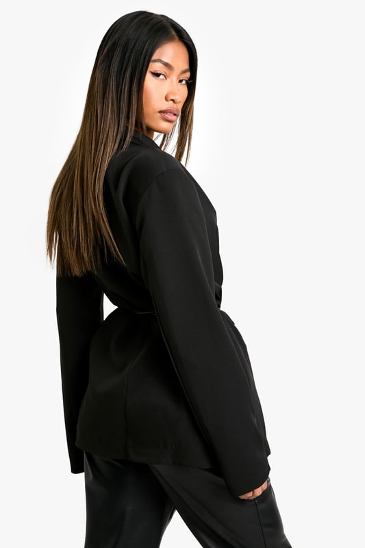 Marl Shoulder Pad Belted Blazer Structured shoulder pads for a bold silhouette
Slim fit design for a sleek, modern look
Belted waist to accentuate your figure
Collared neckline adds a touch of sophistication
Versatile piece suitable for various occasions
Make a statement with this chic blazer that combines style and versatility. The structured shoulder pads create a bold, confident silhouette, while the slim fit design ensures a flattering, contemporary look. The belted waist allows you to customise the fit, emphasising your curves in all the right places. Perfect for a night out on the town, this blazer can be styled with wide-leg trousers and statement jewellery for a head-turning ensemble. Alternatively, dress it down with skinny jeans and ankle boots for a more casual yet polished look. Whether you're heading to a trendy bar or meeting friends for drinks, this blazer will help you radiate confidence and style. Its versatility makes it a must-have addition to any fashion-forward wardrobe, easily transitioning from day to night with a simple change of accessories.