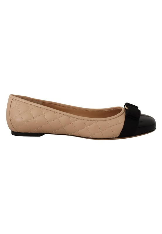 Gorgeous brand new with box tags and dust bag
  100% Authentic Salvatore Ferragamo women’s shoes
  Model: VarinaQ 1cm 0702228 019
  Color: New Bisque / Black
  Material: Nappa and Patent Leather
  Heel 1cm
  Made of sumptuous quilted nappa leather
  Versatile flats with understated elegance
  Iconic Vara grosgrain bow with contrasting patent insert
  Made in Italy