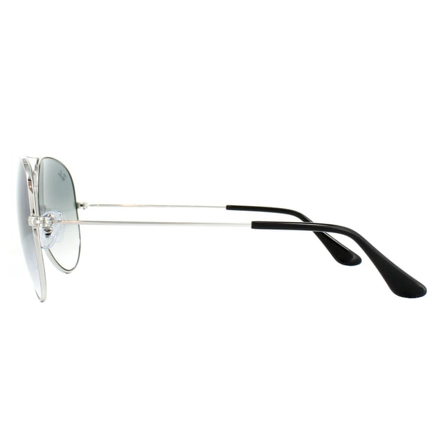 Ray-Ban Sunglasses Aviator 3025 Silver Gradient Light Blue 003/3F 55mm were originally designed in 1936 for US military pilots and have since become one of the most iconic sunglasses models in the world. The timeless design is characterised by the thin metal wire frame, large teardrop shaped lenses and fine metal temples that feature silicone tips and nose pads for a customised and comfortable fit. This classic model is available in various sizes and an array of colourways.