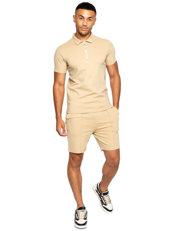 Enzo Mens Collared Polo Tracksuit Set. Collared, ¼ Zip, Short Sleeve Polo. Stitched Trims At Sleeve & Hem. Stretch Fabric For Extra Comfort. Finished with Stretch Shorts. 2 Side Pockets, 2 Back Welt Pockets. Elasticated Waistband With Adjustable Drawstring. Front Pin Tuck Seam