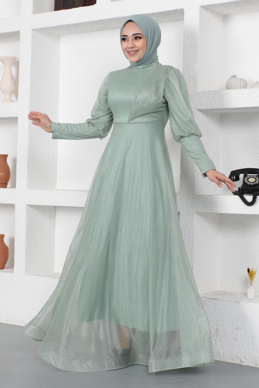 Stoffmerkmal: Hergestellt aus glitzerndem Tüllstoff.Produktmerkmal: Neues Hijab-Modestück der Saison. Gefüttert. Mit einem Rückenreißverschluss für einfaches Anziehen. Mit einem Reißverschluss verziert. Aufgrund von Konzeptaufnahmen kann es leichte Farbabweichungen im Produkt geben. Das Model trägt Größe 38. Größe 38 Abendkleid Maße: Produktlänge: 146 cm - Br